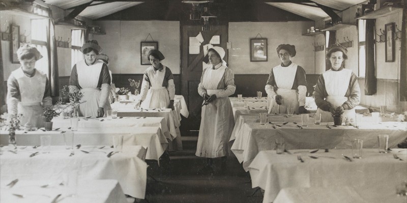 Women's Army Auxiliary Corps waitresses setting tables in an officers’ mess, c1917