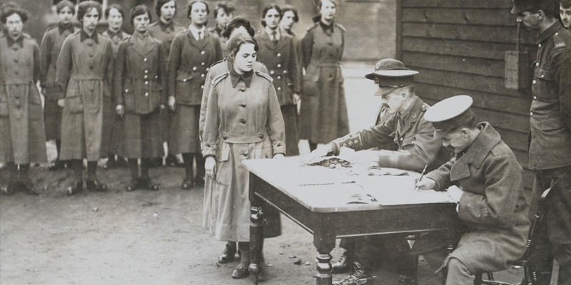 Women’s Army Auxiliary Corps personnel line up for their pay, c1917