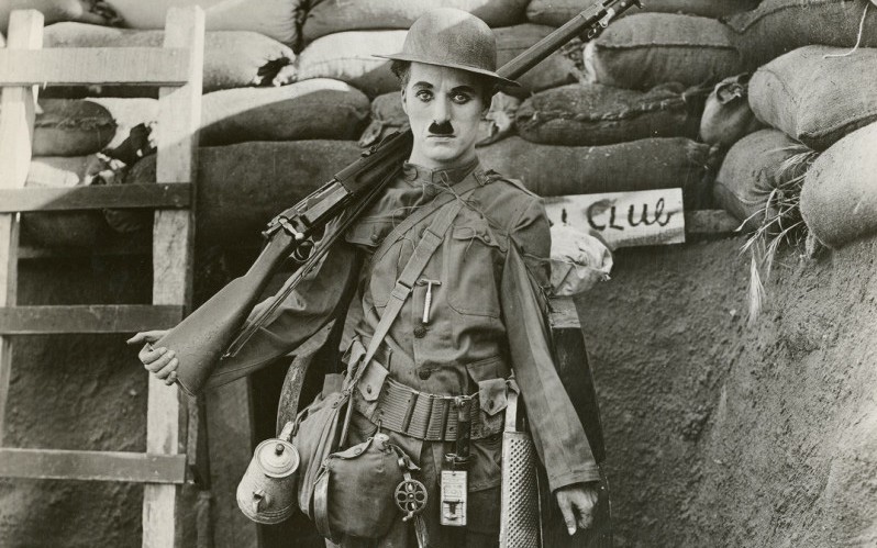 Charlie Chaplin in a promotional photograph for 'Shoulder Arms', 1918