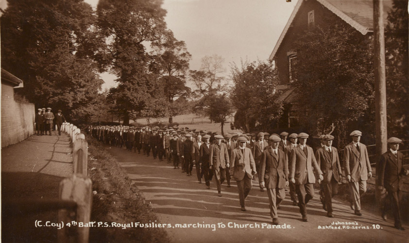 C Coy, 4th Public Schools Bn Royal Fusiliers in civilian dress marching to a church parade, Ashstead, 1914