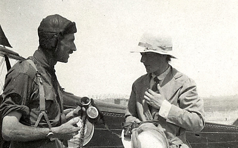Leith-Ross talking to a visiting dignitary shortly after landing his aircraft, Mesopotamia, April 1919