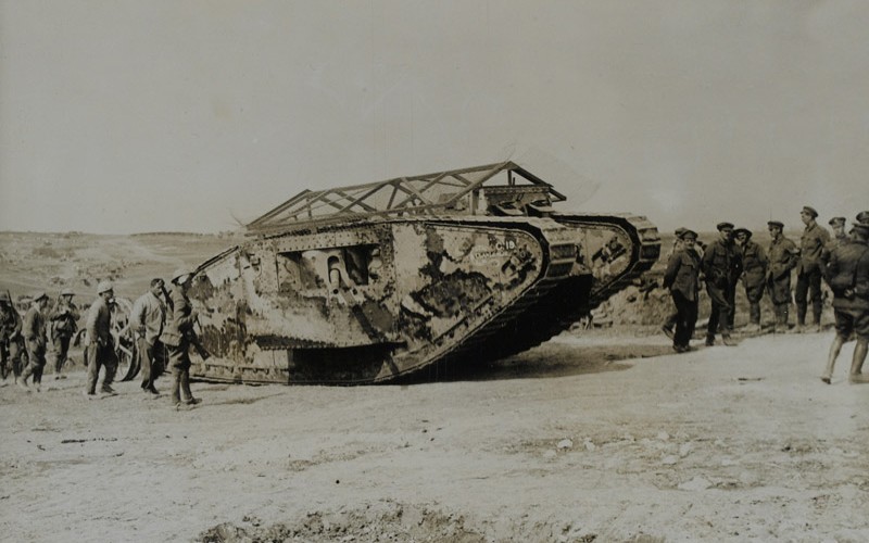 Photograph of troops with tank