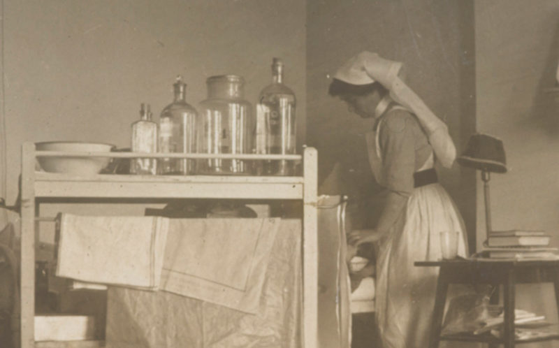 A nursing sister changing the dressings of Cyril’s wounded leg, September 1917