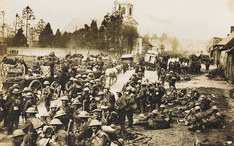 Soldiers gather at Henencourt after their evacuation of Hermies during the Spring Offensive, 26 March 1918