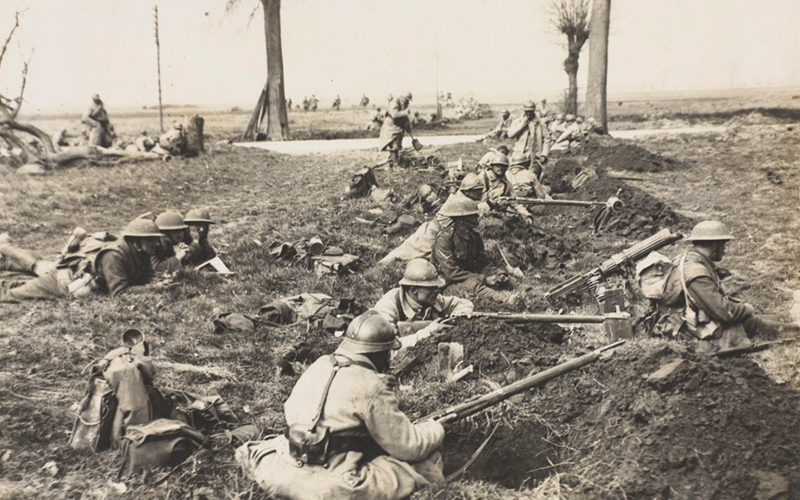 British and French soldiers man hastily-dug trenches, May 1918