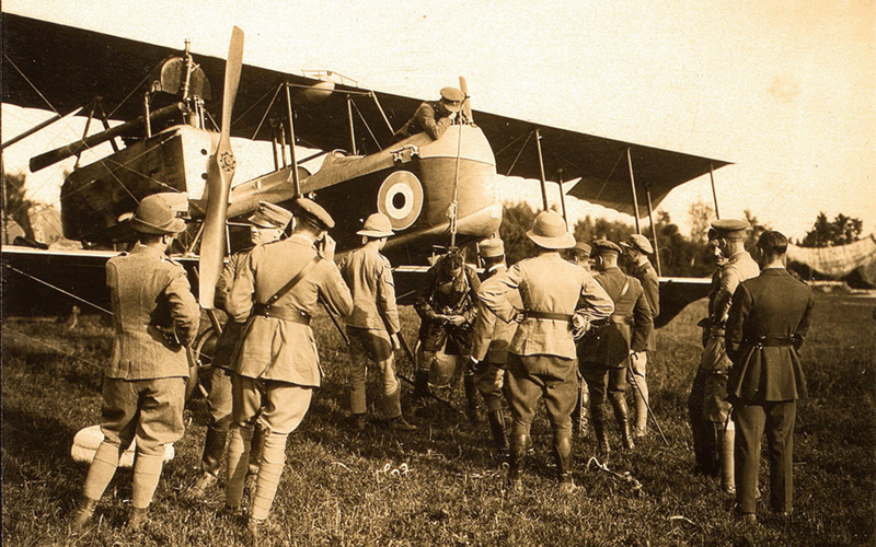 Testing the parachute harness before the drop at Grossa aerodrome, 26 June 1918